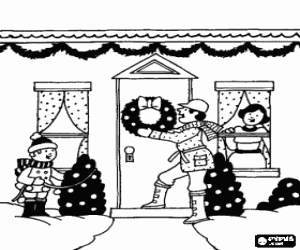 Colora Famiglia che decora l'entrata a casa sua per il Natale