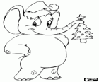 Elefante con un cappello di Babbo Natale e l'albero di Natale nel tubo