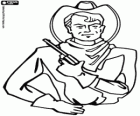 Un cowboy con la pistola in mano