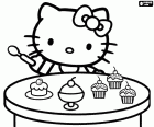 Hello Kitty con un cucchiaio in mano pronto a mangiare alcuni deliziosi cupcakes. Hello Kitty ama dolci, lei è molto golosa