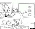 Thomas il treno visto dalla finestra della classe, dove i bambini stanno imparando l'alfabeto con il loro insegnante
